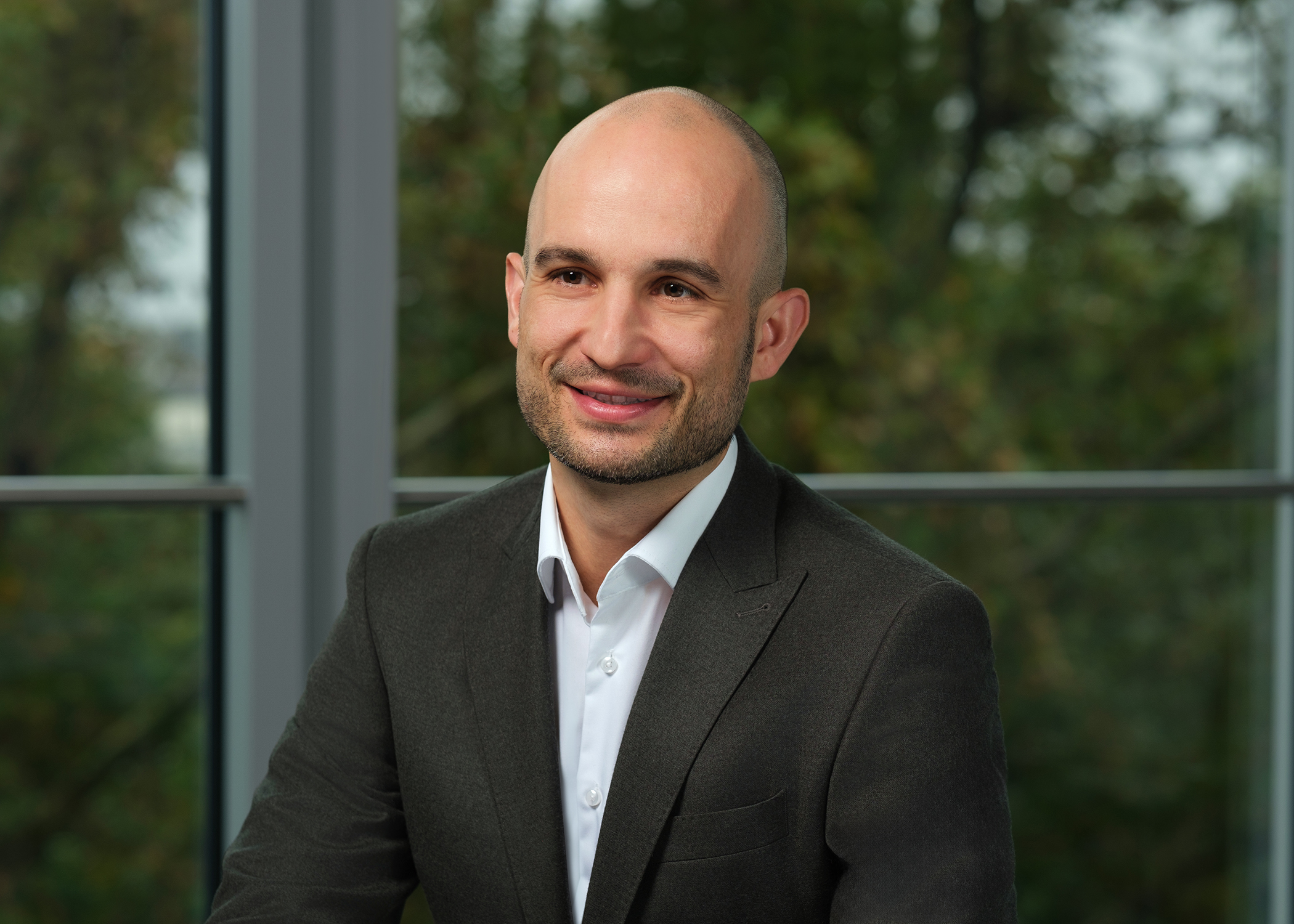 Dr. Deniz Tschammler